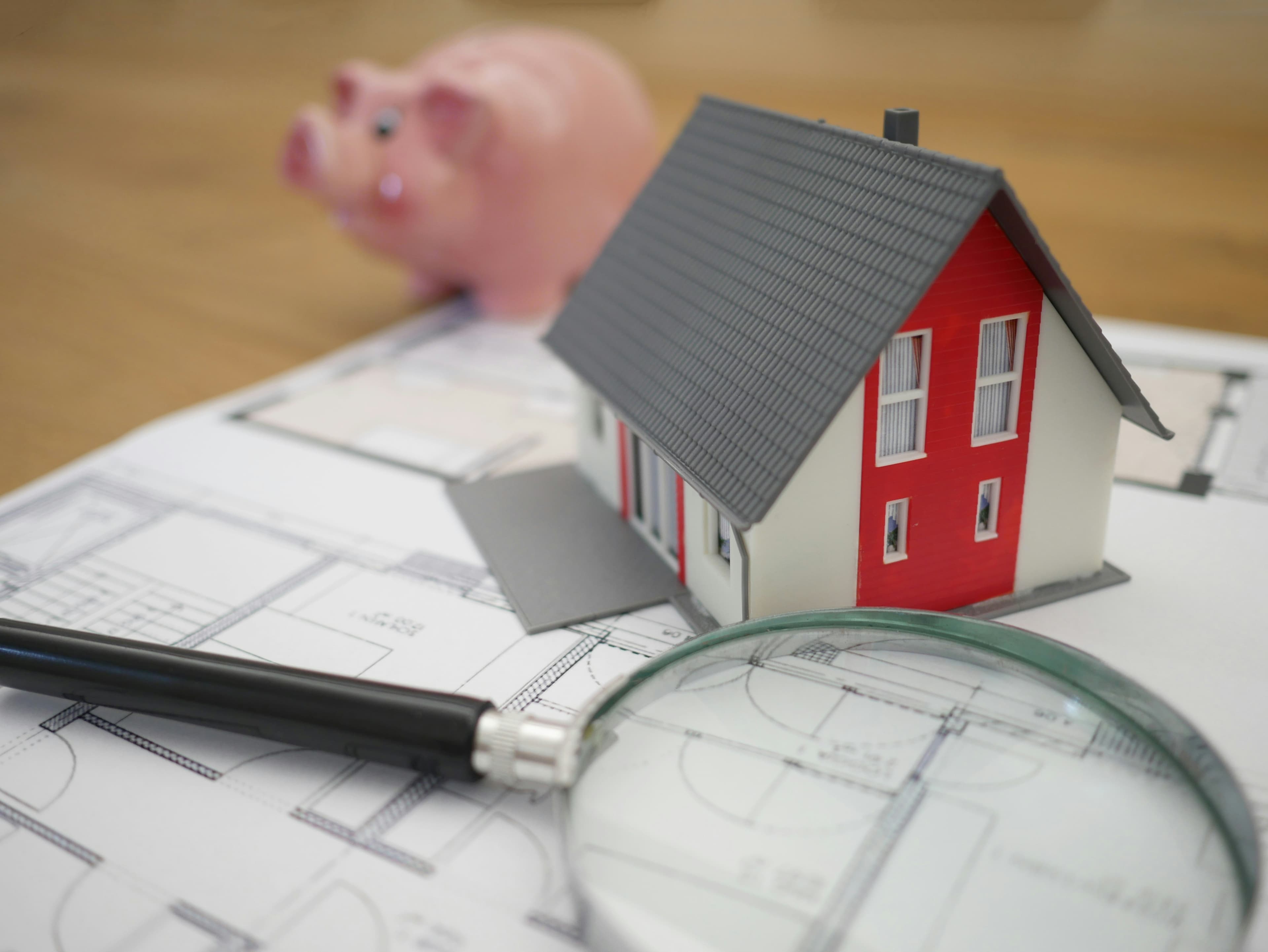 House keys resting on paperwork as a buyer and seller negotiate a price after the survey