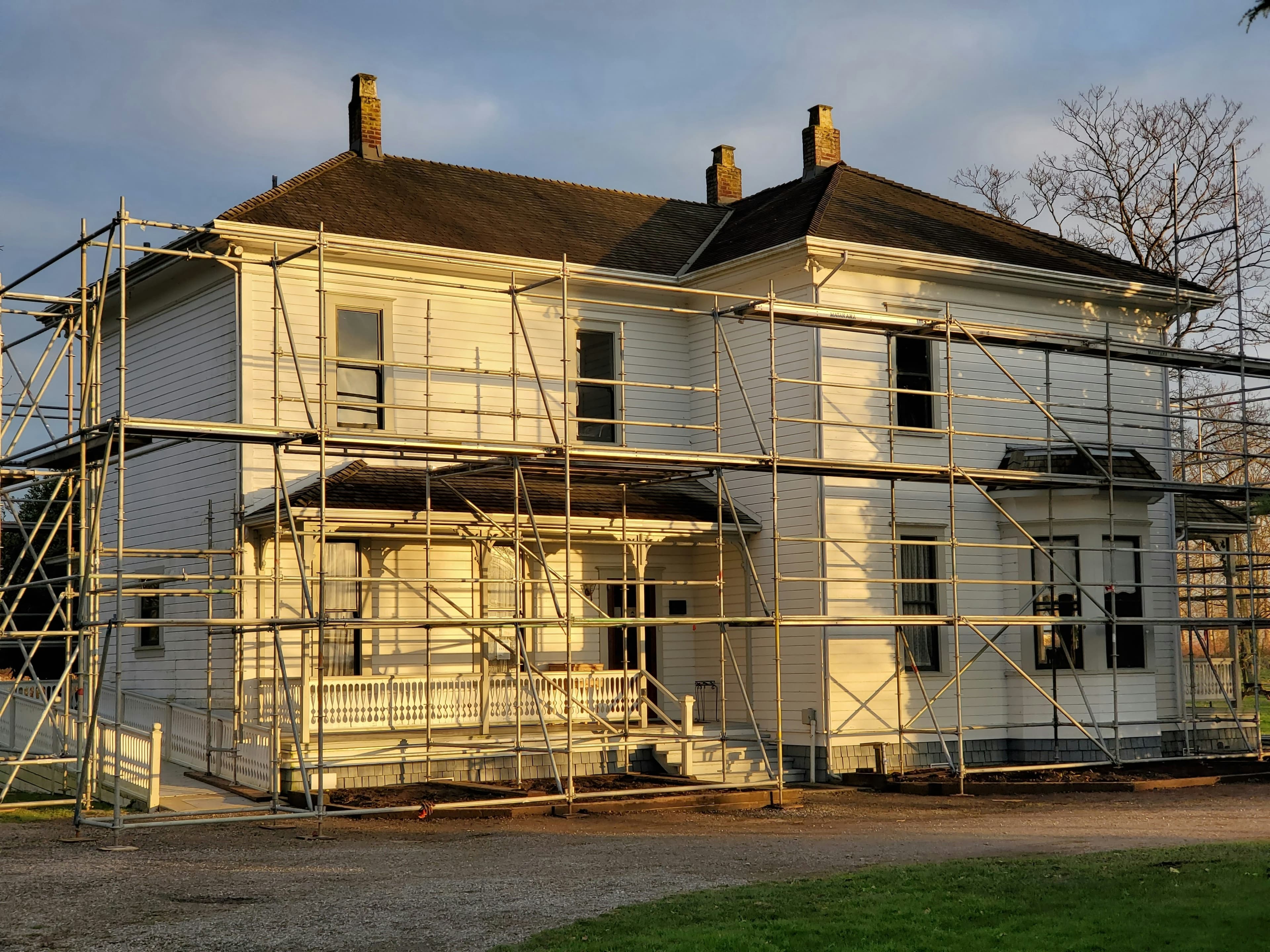 A house exterior on a quiet day, representing the anxious wait a seller feels when a buyer goes silent after the survey