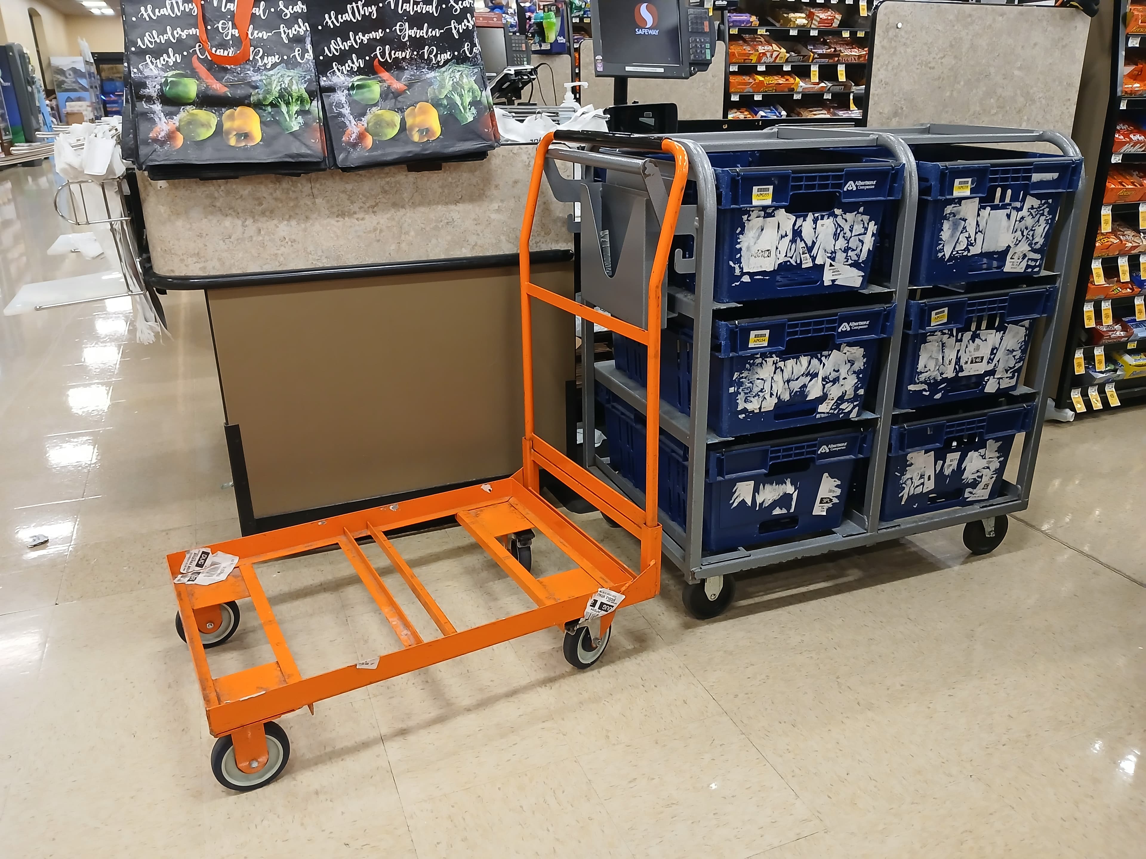 Moving boxes stacked on a trolley, ready for a house move.