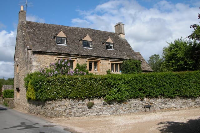 A stone-built Cotswold house in the village of Naunton, Gloucestershire