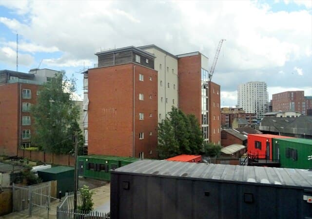 A low-rise brick block of residential flats in Reading, England