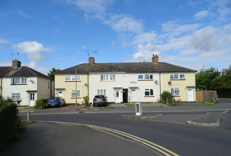 A row of suburban semi-detached houses on West Avenue in Chelmsford, Essex