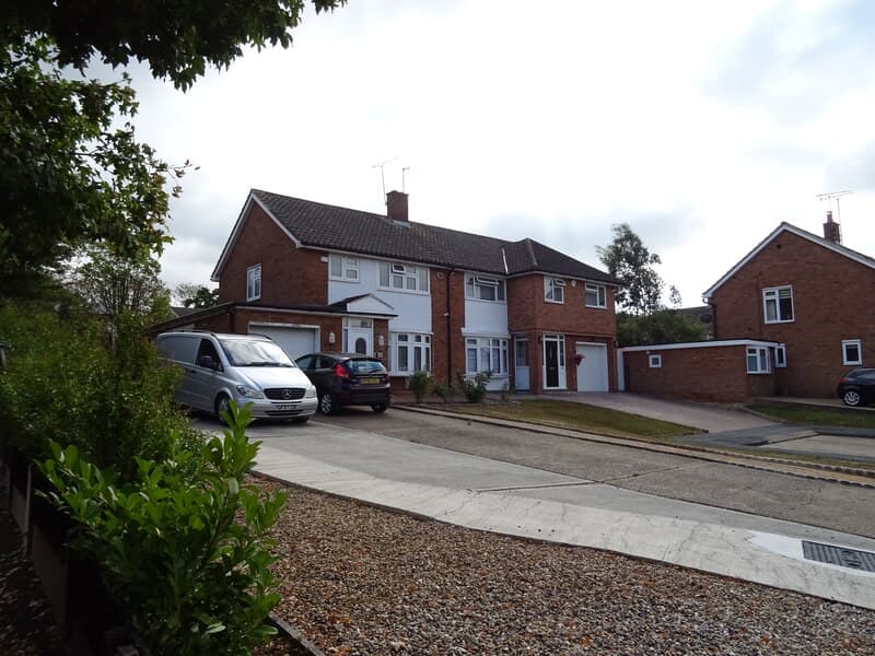 A residential street of houses on Kingfishers in Basildon, Essex