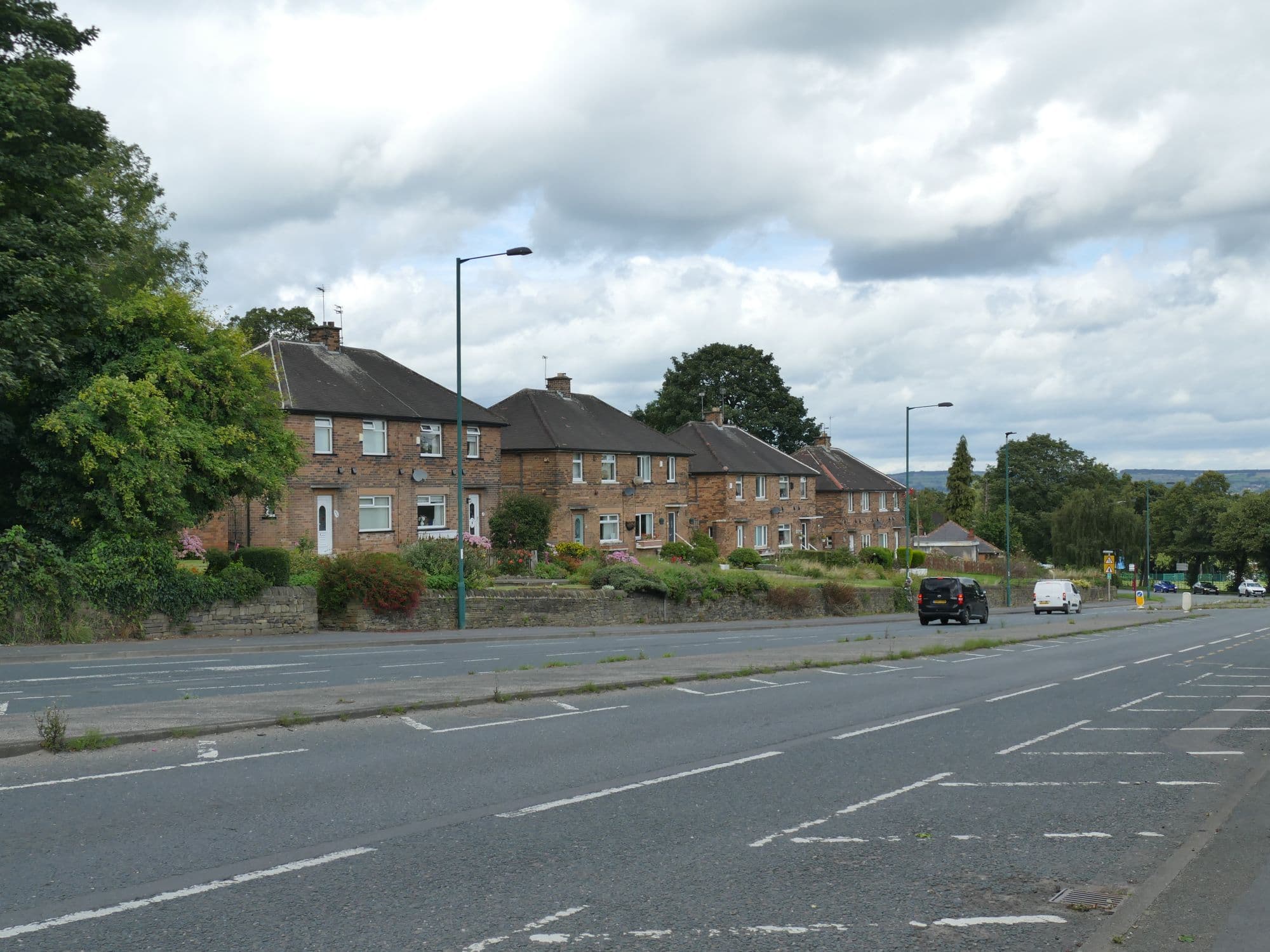 A row of semi-detached houses on Harrogate Road, typical first-time buyer homes