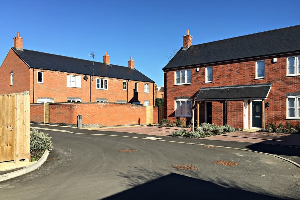 A row of new-build terraced houses on a residential close in Warwick